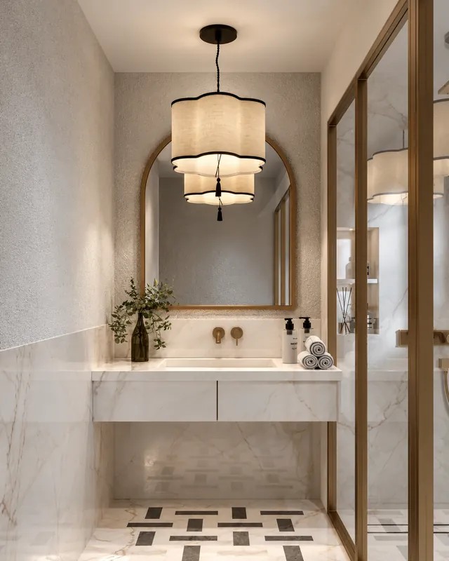 Powder room with an arched mirror and pendant light